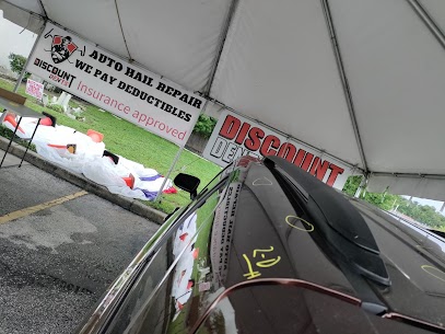 Vehicle with visible hail dents ready for repair help in the Edgewater area