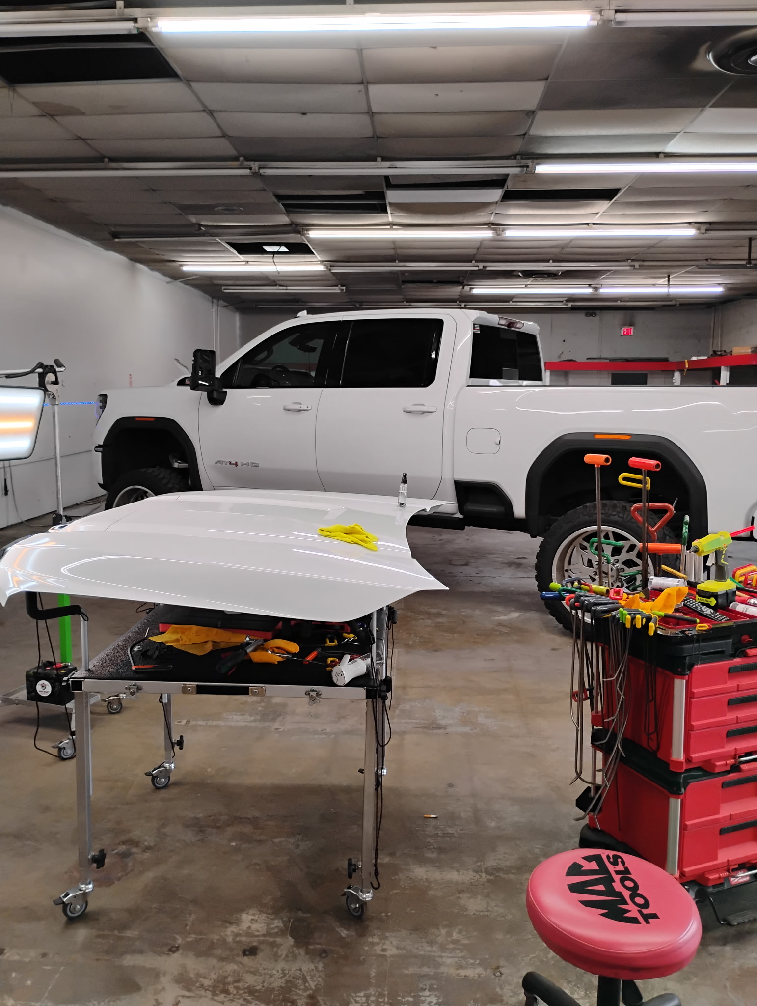 Paintless dent repair work showing reflection and body line detail